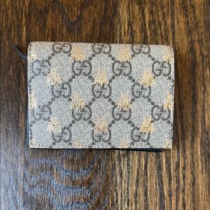Gucci bee gold patterned Wallet